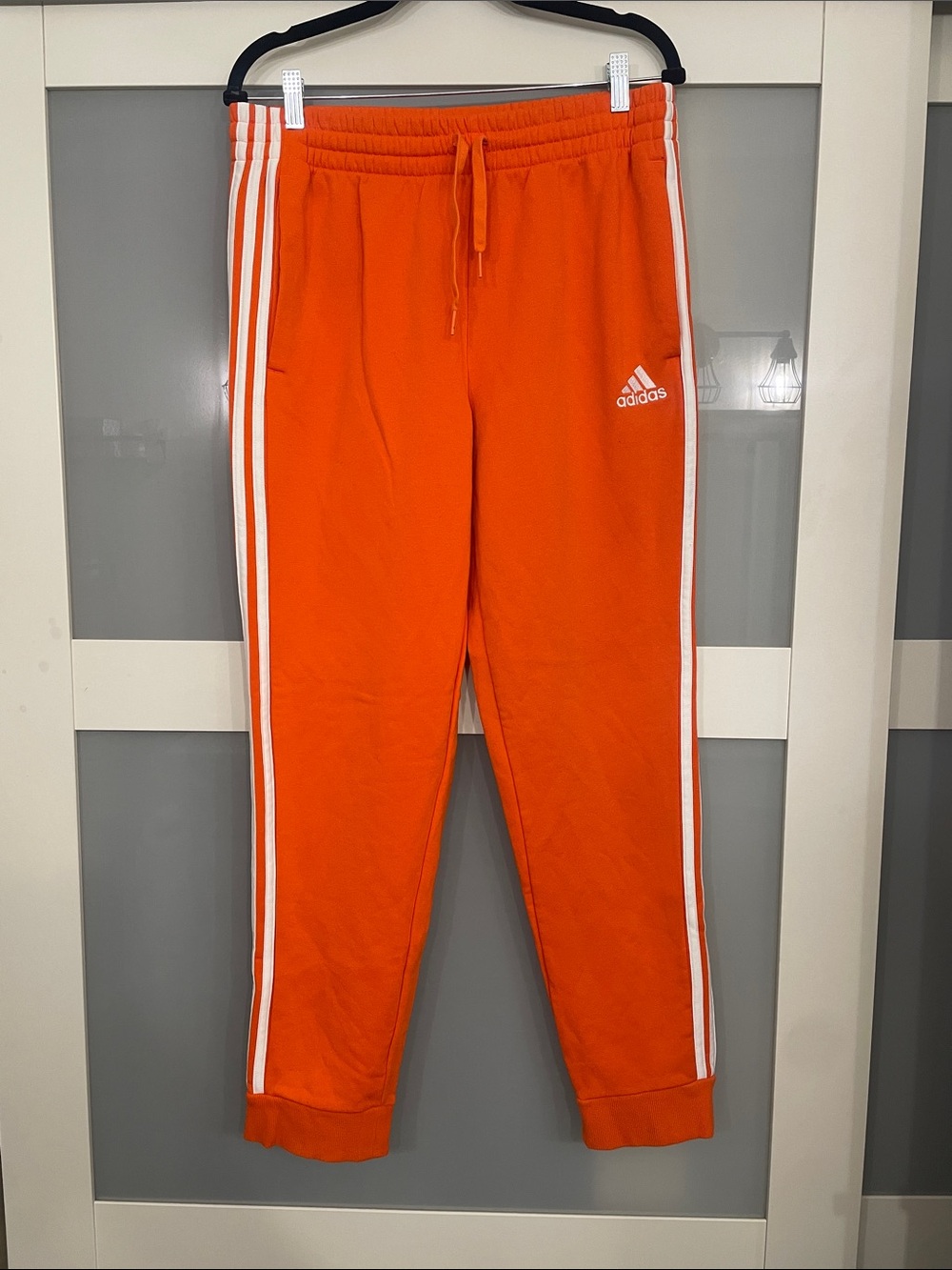 Adidas Orange Joggers with White 3-Stripes